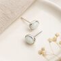 White Opal Oval Stud Earrings In Sterling Silver – 7mm, thumbnail 1 of 11