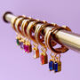 Gold Plated Huggie Hoop Earrings With Baguette Stones, thumbnail 3 of 12