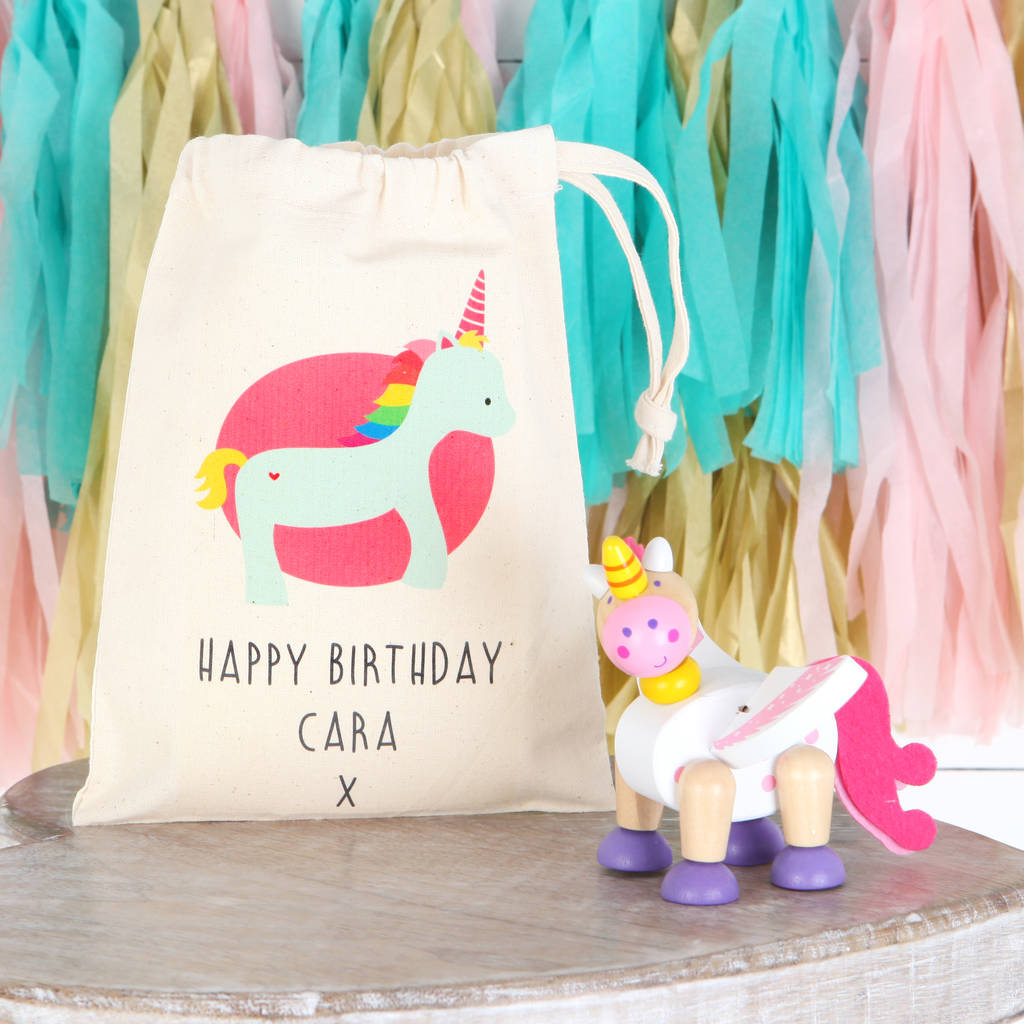 Wooden Unicorn Flexible Toy And Personalised Cotton Bag, 1 of 5