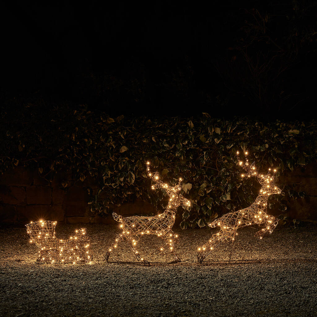 Rattan Light Up Reindeer And Sleigh Outdoor Decoration, 1 of 4