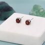 Sterling Silver Genuine Garnet Stud Earrings, thumbnail 1 of 11