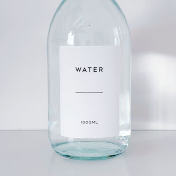 Clear Glass Bottle With Screw Lid And Personalised Waterproof Label, 9 of 9