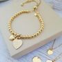 Yellow Gold Ball Slider Bracelet With Engraved Heart Charm, thumbnail 1 of 8