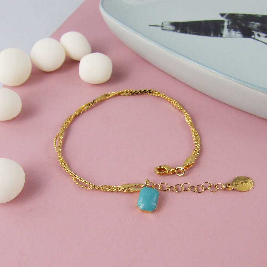 gold double chain bracelet with geometric charm by aliquo