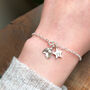 Personalised Sterling Silver Small Holly Initial Star Christmas Necklace, thumbnail 10 of 12