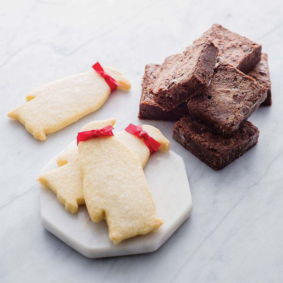 trio of smart penguin biscuits and a brownie by the english cream tea