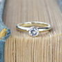 Solid Gold White Sapphire Solitaire Engagement Ring, thumbnail 1 of 5