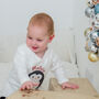 Personalised Penguin Baby First Christmas Babygrow, thumbnail 4 of 12