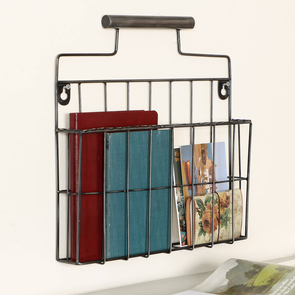 contemporary metal wall mounted magazine rack by dibor