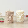 Neutral Christmas Pillar Candle With Christmas Reindeer, thumbnail 2 of 10