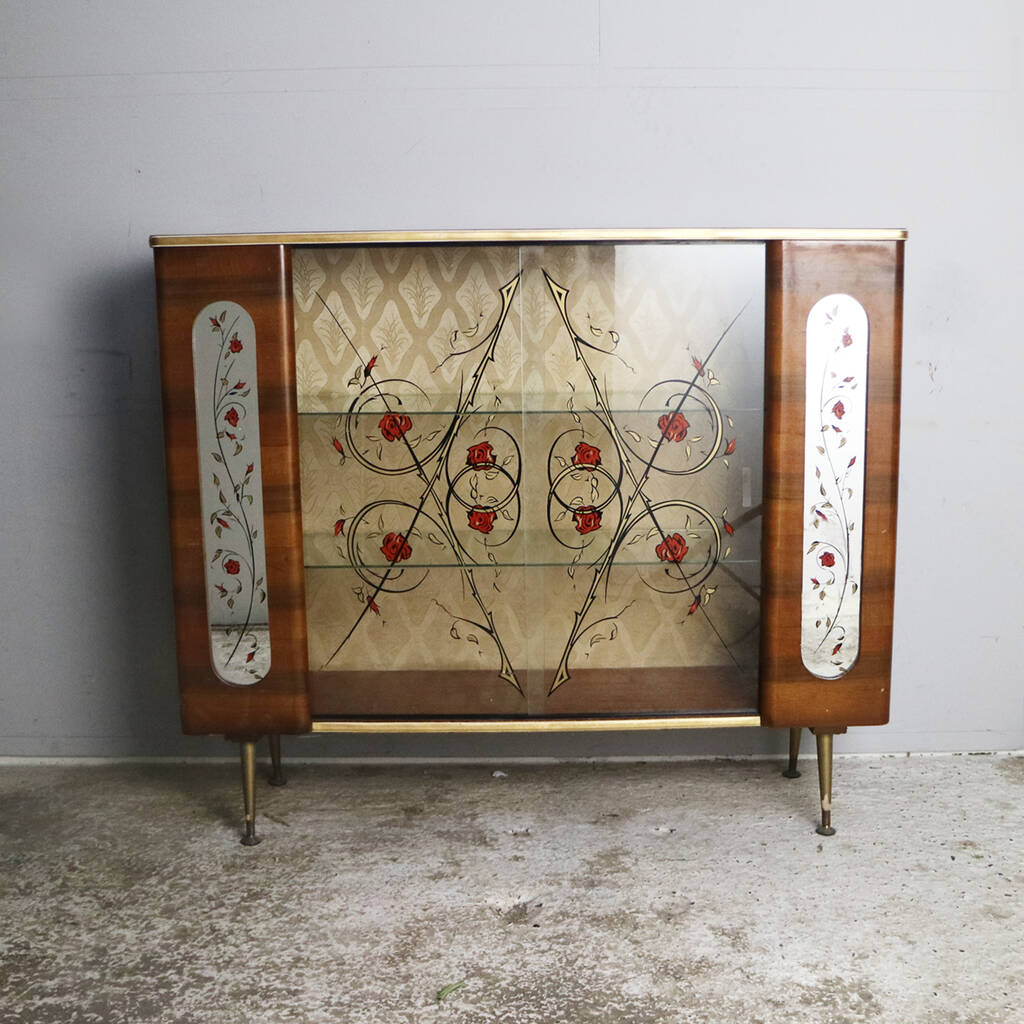 1950’s vintage glass display by proper.