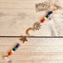 Recycled Brass Sun Moon And Star Chakra Hanging Bell, thumbnail 2 of 8
