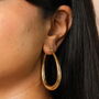Stainless Steel Oversized Teardrop Hoop Earrings In Gold Plating, thumbnail 3 of 5