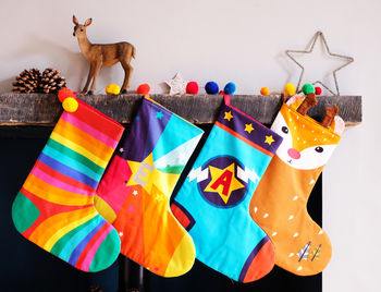 Personalised Christmas Stocking Pom Pom Rainbow Stripe, 5 of 5