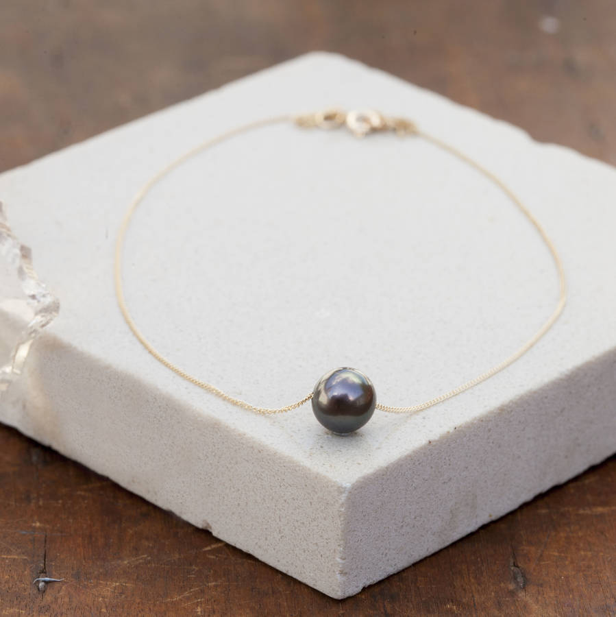 gold floating pearl necklace by joulberry