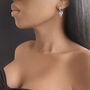 Sterling Silver Heart Huggie Hoop Earrings Silver, thumbnail 1 of 2