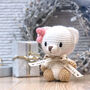 Hand Knitted Personalised Mini Teddy Bear With Bow, thumbnail 1 of 7