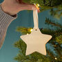 Personalised Engraved Ceramic Star Christmas Decoration, thumbnail 1 of 3