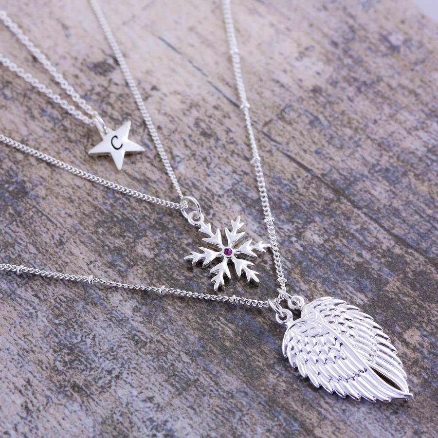 set of layered christmas charm necklaces by j&s jewellery