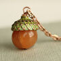 Amber Orange Small Moss Acorn Necklace, thumbnail 1 of 9