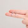 Sterling Silver Tiny Starburst And Moonstone Stud Earrings, thumbnail 6 of 11