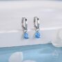 Sterling Silver Aquamarine Blue Pear Cut Cz Huggie Hoop Earrings, thumbnail 1 of 12