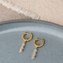 Linear Huggie Crystal April Birthstone Earrings, thumbnail 3 of 7