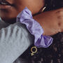 Silk Scrunchie With Brass Venus Charm, thumbnail 1 of 6