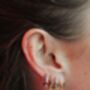 Cosima Gold Rainbow Star Huggie Earrings, thumbnail 2 of 2