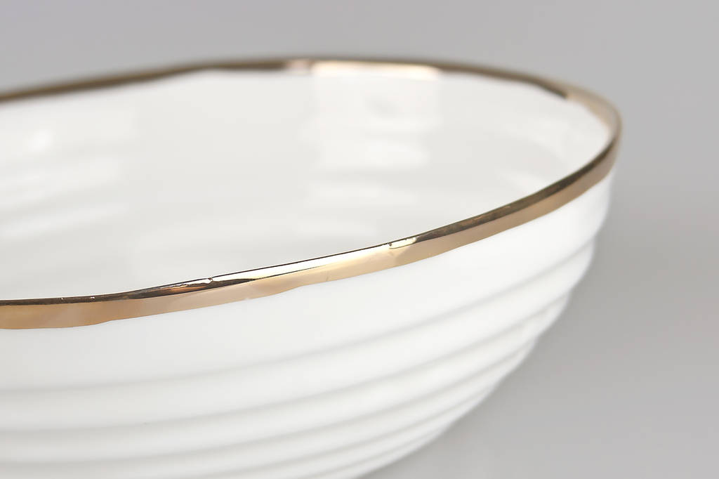 porcelain serving bowl with thick gold rim by kina ceramics