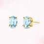 Blue Topaz Oval Stud Earrings In Sterling Silver And Gold, thumbnail 6 of 11