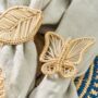 Set X Four Woven Natural Iraca Butterfly Napkin Ring, thumbnail 5 of 5