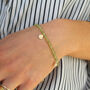 Peridot And Organic Coin Bracelet 9ct Gold Or Silver, thumbnail 1 of 4