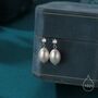 Sterling Silver Genuine Freshwater Pearl And Cz Drop Earrings, thumbnail 1 of 10