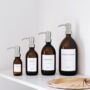 Amber Bottle With White Personalised Label And Silver Pump, thumbnail 1 of 9
