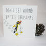 Don't Get Wound Up Tin Toy Christmas Card, thumbnail 2 of 5