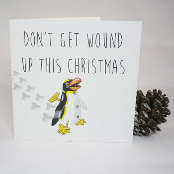 Don't Get Wound Up Tin Toy Christmas Card, 2 of 5
