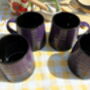 Set Of Four Reactive Glaze Brûlée Mugs In Black And Deep Purple, thumbnail 6 of 8
