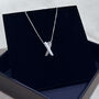 Sterling Silver Kiss Cross Pendant Necklace, thumbnail 1 of 6