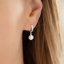 Sterling Silver Round Pearl Huggie Hoop Earrings, thumbnail 4 of 7