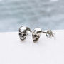 Tiny Skull Sterling Silver Stud Earrings, thumbnail 1 of 5