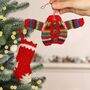 Set Of Two Fair Trade Knitted Christmas Decorations, thumbnail 1 of 5