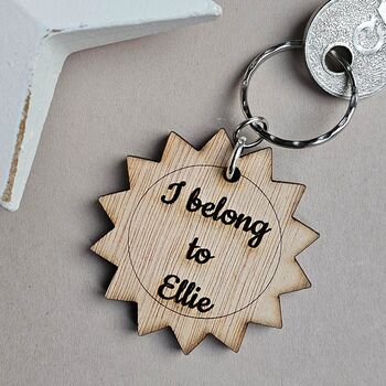 Personalised 'I Belong To…' Wooden Sun Keyring, 2 of 3