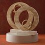 Set Of Two Brass Snake Travertine Circle Sculptures, thumbnail 1 of 2