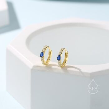 Tiny Pear Shape Sapphire Blue Cz Huggie Hoops, 3 of 11