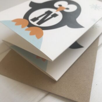 Noel Concertina Penguin Christmas Card, 3 of 5