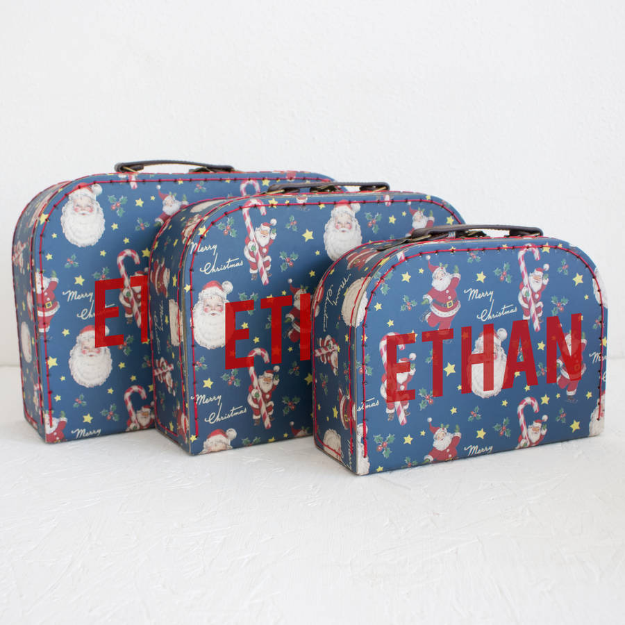 personalised christmas santa suitcase storage box trio by we love to