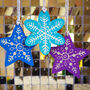 Star And Snowflake Linocut Wooden Christmas Decorations, thumbnail 3 of 5
