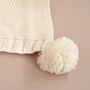 Personalised Ivory Knitted Baby Blanket With Pom Poms, thumbnail 2 of 7