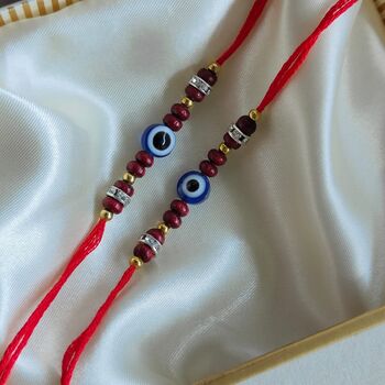 Red Sandalwood Evil Eye Zircon Rakhi For Raksha Bandha, 2 of 5